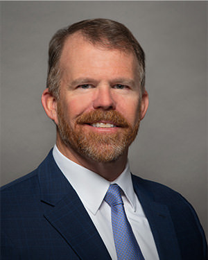 John Crump, Senior Managing Director, Finance